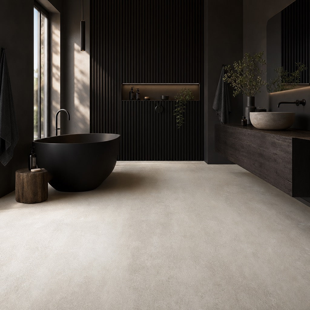 Dark dramatic bathroom with black tub